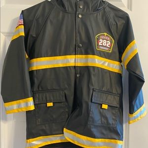 Kids raincoat, lightly used-like new. Midweight, nice material, quality made
